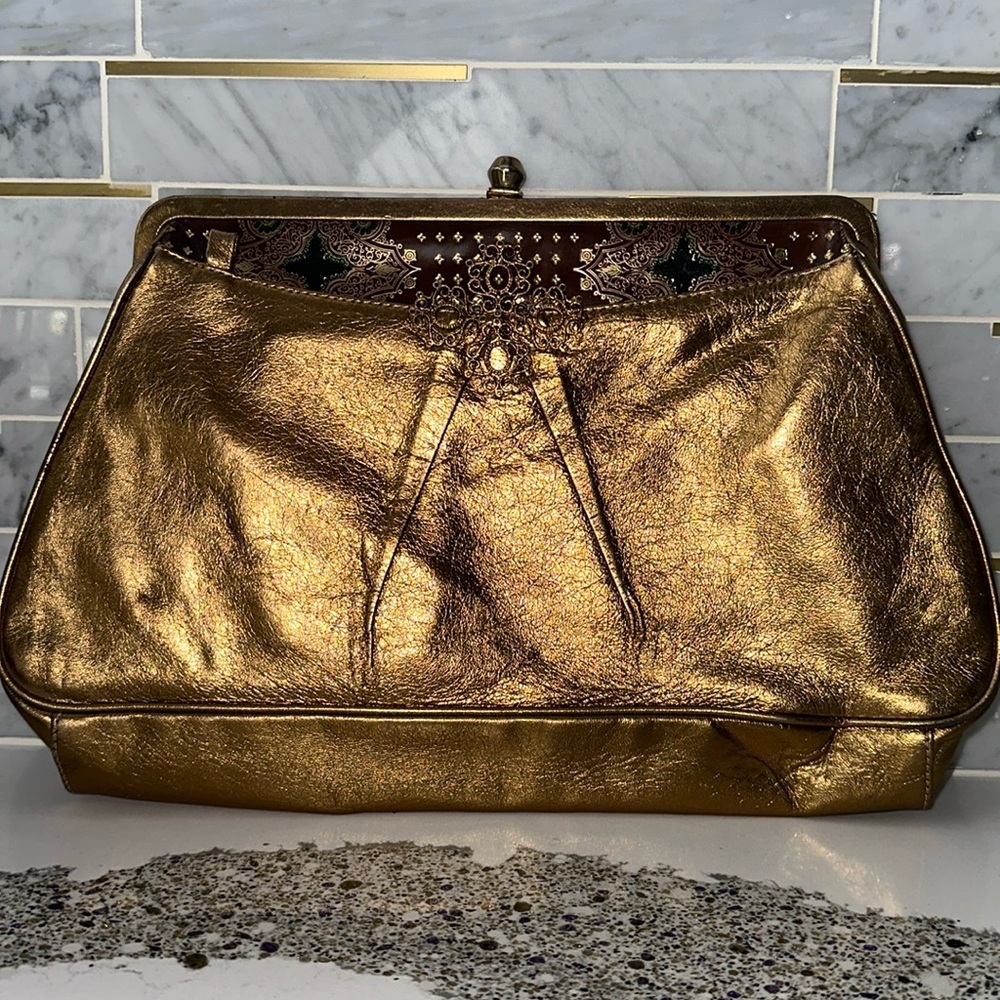 Gorgeous metallic oversized gold clutch bag